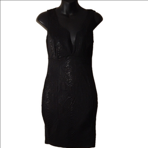 Foreign Exchange black snakeskin look dress. Great style and fit. Size small.